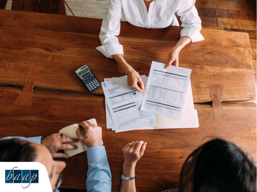 Business owners meeting with a CPA business advisor